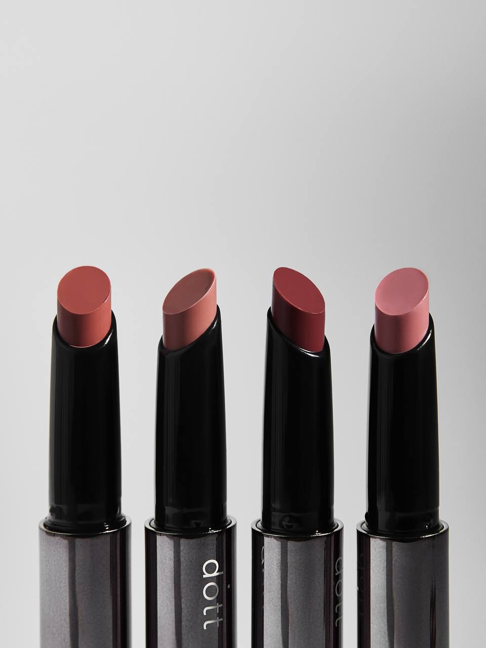 Танучий бальзам для губ Dott Melt Lip Balm
